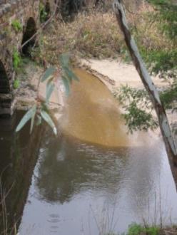 Sand slug moved under old bluestone bridge 24-7-14