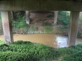 View of waterway under bridge