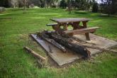 Picnic table with flood debri